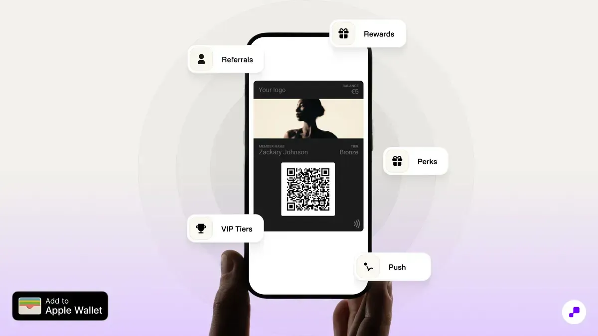 Apple Wallet loyalty card on iPhone showing points balance and tier status for a Shopify store